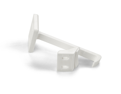 Vit plastregel med fyrkantigt huvud och lång arm.